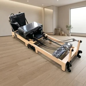 Factory Supply Adjustable Foldable Maple Wood Pilates Studio Reformer for Yoga and Studio Use
