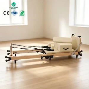 Space-Saving Foldable Maple Oak Pilates Reformer 7-Gear Adjustable Footbar 74kg Studio Home Gym CE RoHS Certified Customizable